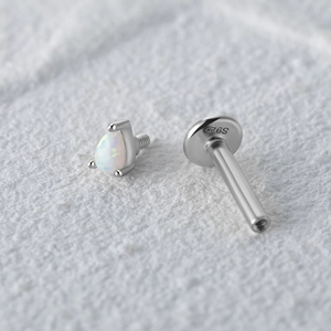 Macro view of teardrop opal S925 sterling silver flat back stud earring with screw thread