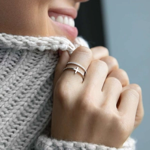 Minimalist double-layer 925 sterling silver ring with cross design on female hand