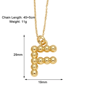 Detail of gold letter F pendant necklace with beaded design and exact dimensions