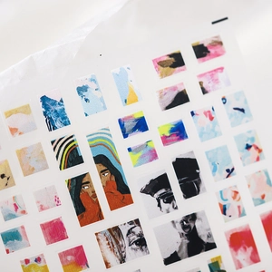 Artistic matte nail stickers with abstract portraits and colorful watercolor patterns