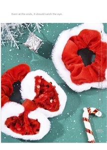 Detail of red velvet scrunchie with white plush trim and sparkling sequin bow