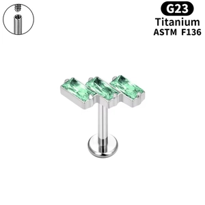 G23 Titanium labret stud with three green zircons and internal threading detail