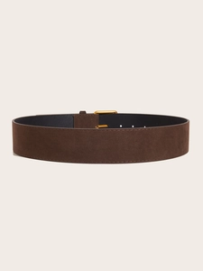 Detailed view of dark brown suede wide belt with vintage golden square pin buckle