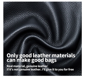 Macro shot of high-quality black genuine leather showing natural grain and soft texture