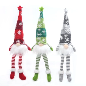 Set of three lighted Christmas gnomes with striped legs in red, green, and gray colors