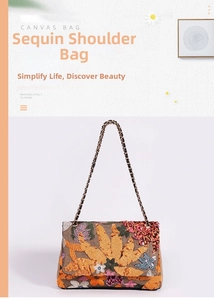 Detail showing colorful sunflower sequin embroidery and leather chain strap on canvas bag