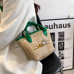 Women's summer woven bucket bag with green handles and tiger embroidery detail