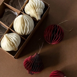 Foldable honeycomb paper Christmas tree ornaments set in beige and deep red with hanging loops