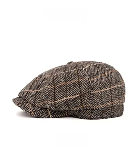Side view of newsboy cap showing textured plaid pattern and tweed fabric detail