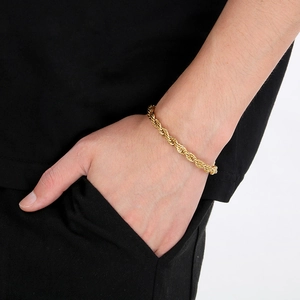 Minimalist 18k gold plated stainless steel twisted rope chain bracelet on model wrist