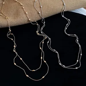 Minimalist double layer beaded metal necklace in gold and silver finish for women
