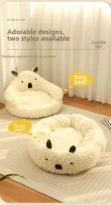 Plush alpaca style pet bed in white fleece for cozy cat sleeping and home comfort