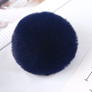 Macro shot of 8cm navy blue faux rabbit fur pom-pom showing fluffy texture and soft fibers