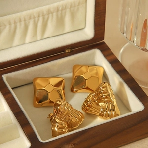 Square and triangle 18k gold plated titanium steel earrings in a wooden jewelry box