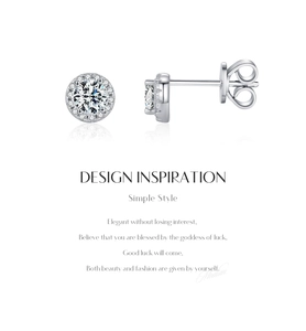 Macro detail of round moissanite earrings with halo design on a clean white background