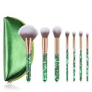 7pcs professional makeup brush set with green glitter handles and a matching pouch