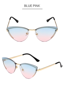 Detail of rimless cat eye sunglasses with blue-pink gradient lenses and gold metal frame