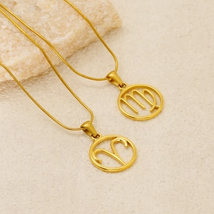 Golden titanium steel snake chain necklace with Aries and Virgo zodiac pendants on stone