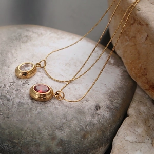 Oval zircon necklaces in gold-plated titanium steel with red and white gemstones