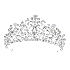Elegant silver bridal crown with intricate leaf patterns and sparkling pear-cut crystals
