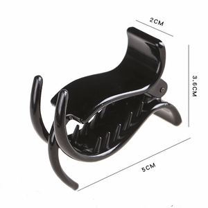 Detail shot of black claw clip showing specific dimensions 5cm length and 3.6cm height