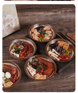 Close-up of artificial snail rice noodles with chicken feet and assorted toppings