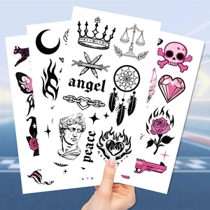 Detail of waterproof rose skull tattoo stickers featuring angel and peace text elements