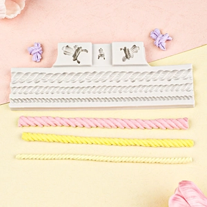 Silicone rope texture mold for cake decoration with finished pink and yellow fondant twists