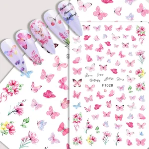 Detail view of F1028 nail art stickers featuring pink butterfly and floral patterns