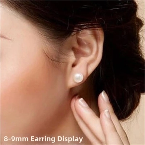 Close-up of 8-9mm genuine freshwater pearl stud earring worn on a model's ear