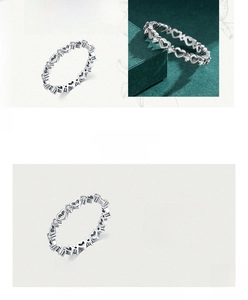 Détail de bague cœur en argent S925 montrant le sertissage de zircon et le poinçon S925