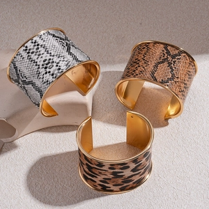 Retro wide open cuff bracelets set with leopard and snake skin patterns for women