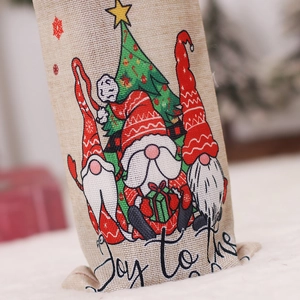 Christmas burlap wine bottle cover featuring forest gnome prints and joy holiday typography