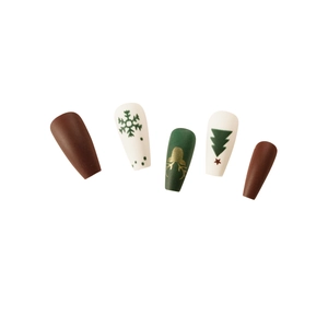 Matte Christmas press on nails set with reindeer and snowflake patterns on white background