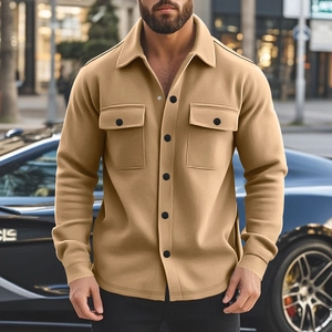 Detail of camel fleece-lined casual jacket with flap pockets and premium fabric texture