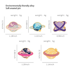 Enamel galaxy space pin set featuring pink and purple planet designs in alloy metal