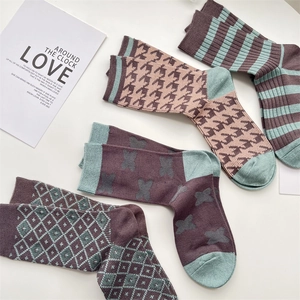 Cozy autumn winter plaid cashmere socks for women in soft purple and pink hues