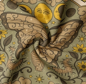 Detail showing the thick cotton linen fabric texture and vintage mystical moth printing