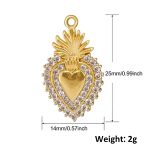 Macro view of gold heart pendant with radial lines and micro-inlaid zircon details