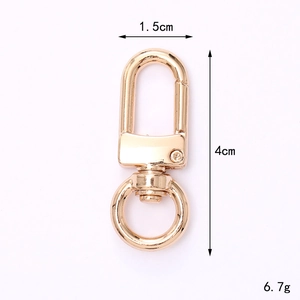 Golden spring ring and swivel clasp with dimensions 4cm length and 1.5cm width