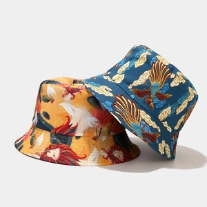 Double-sided reversible bucket hat with crane and phoenix oriental embroidery pattern