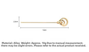 Detailed view of golden hair fork with three interlocking rings and 12cm size marking
