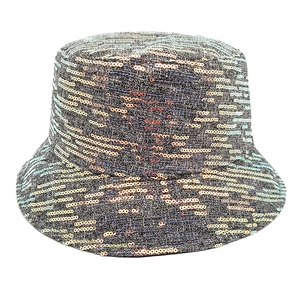 Close-up of shimmering iridescent sequins on a bucket hat showing metallic color gradients