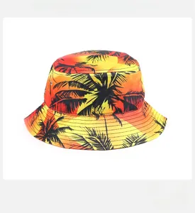 Detail of tropical palm tree print on a wide-brim fisherman hat with vibrant gradient colors