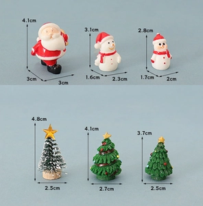 Detailed dimensions of miniature Christmas figurines including Santa, Snowman, and Trees