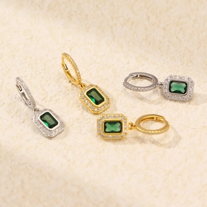 Luxurious S925 silver hoop earrings with emerald green gemstones and sparkling pavé diamonds