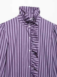 Detail of ruffle stand collar and layered pleats on purple striped long sleeve shirt