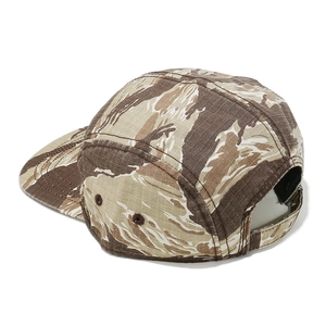 Detail view of the 5-panel cap featuring tiger stripe camo and adjustable buckle strap