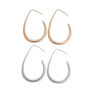 Minimalist teardrop metal hoop earrings in gold and silver finish set on white background