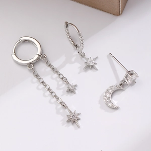 Elegant asymmetric silver star and moon earring set with cubic zirconia dangles